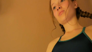 Alisa L Blue leotard and knee-length socks.