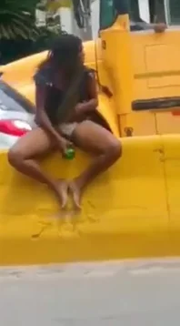 Amateur ebony masturbate on a street by bottle