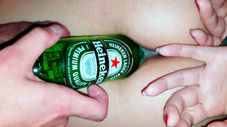 Tied up whore has a beer bottle put in her pussy to make room for the small dick she will receive