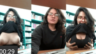 Vintage viral busty Desi girl in library pulls shirt up to