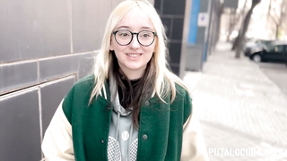 The girl with glasses is a pretty blonde.