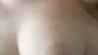 Beautiful wife playing with her natural BOOBS