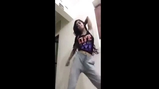Indian girl playing with her boobs in public library