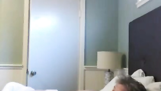 grandmother touches granddaughter while she sleeps