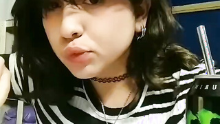 brunette plays with her breasts